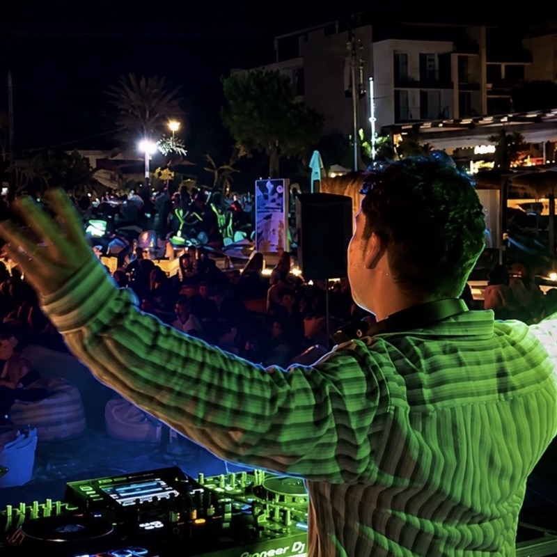 PERNAM performing a DJ set for a crowd